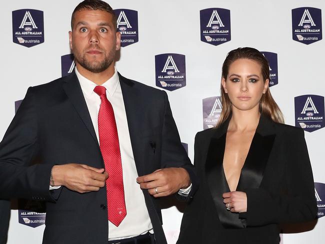 Lance “Buddy” Franklin and Jesinta prepare to pose on the red carpet.