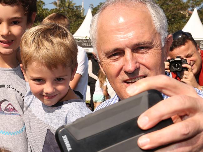 Federal Election 2016 22/5/16: Day 14 of the Federal Election campaign. Prime Minister Malcolm Turnbull, meets locals, kids, and has selfies taken as he walks around Taste Orange Food and Wine festival at Watsons Bay, Sydney. Lyndon Mechielsen/News Corp.