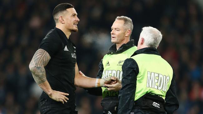 Sonny Bill Williams of the All Black has his shoulder checked after a knock.