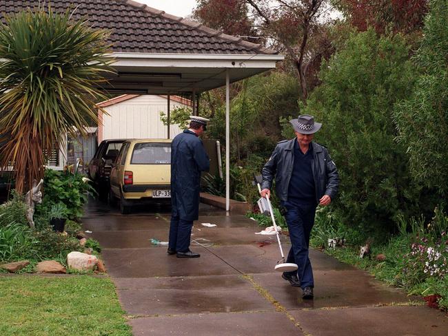 Taxi driver murder at Klemzig - police holding  metal detector at scene. sa shooting  andrew mordowicz  /Murder/SA/Mordowicz