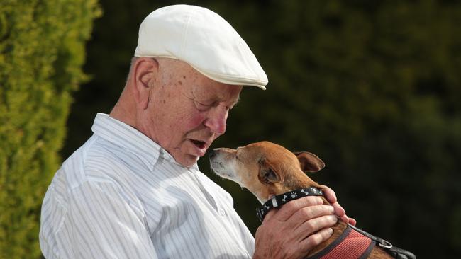 John Plakke, from St Helens Park, was reunited with his dog Jack on Father's Day after he was missing for three weeks. Picture: Robert Pozo