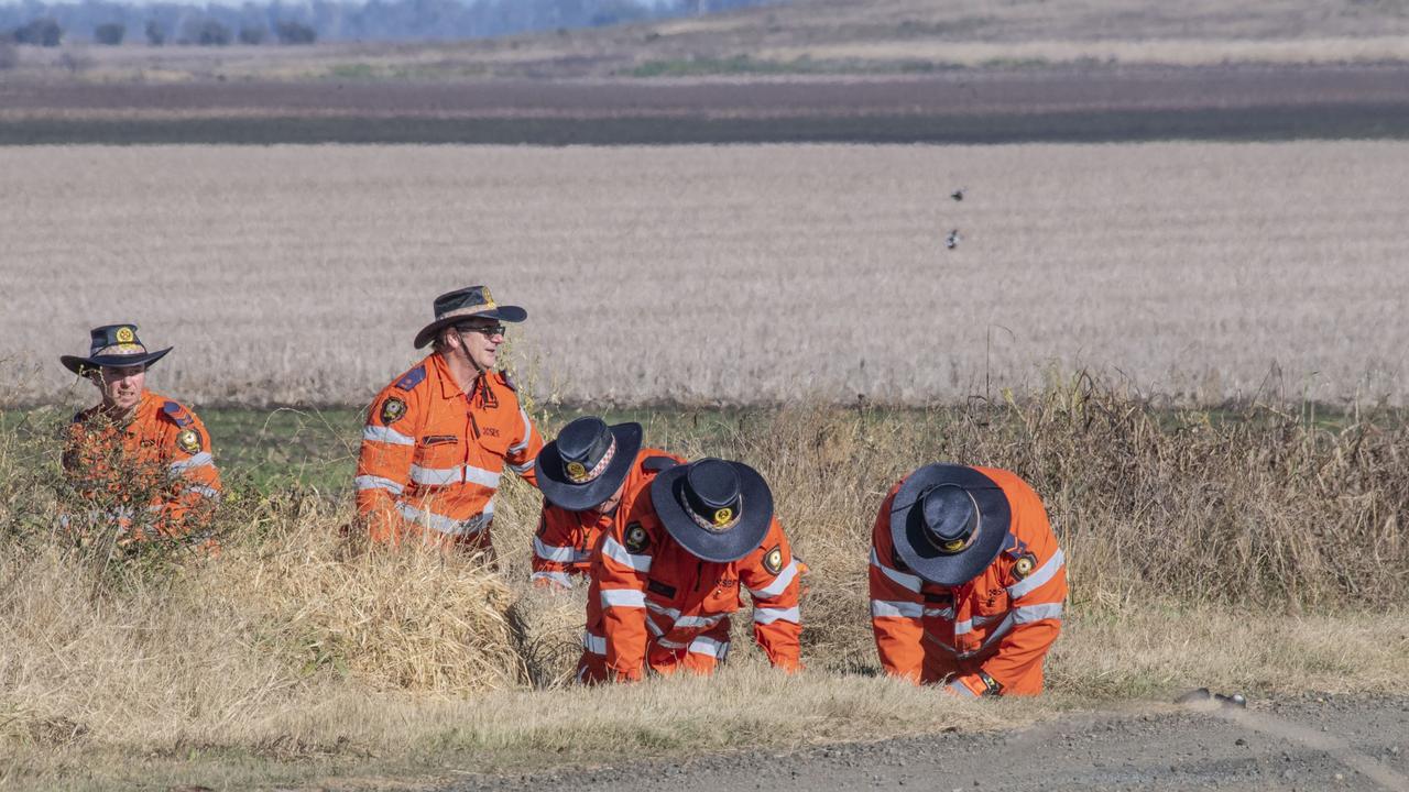 Police and SES personnel conduct ground searches at the intersection of Tyson Rd and Toowoomba Karara Road, Felton. Picture: Nev Madsen.