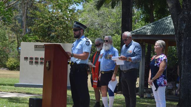 Whitsunday Police Acting Officer-in-Charge Jason Colley read the Ode at the Remembrance Day ceremony in Airlie Beach. Picture: Laura Thomas