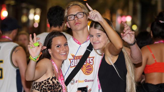 Abby Green, Aldan McComisky and Lucy Forster in Surfers Paradise during last year’s Schoolies celebrations. Picture: AAP Image/Richard Gosling