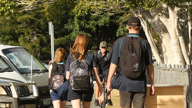 Students leaving Elanora State High seemed unconcerned by threats allegedly made by one of their classmates. Picture Mike Batterham