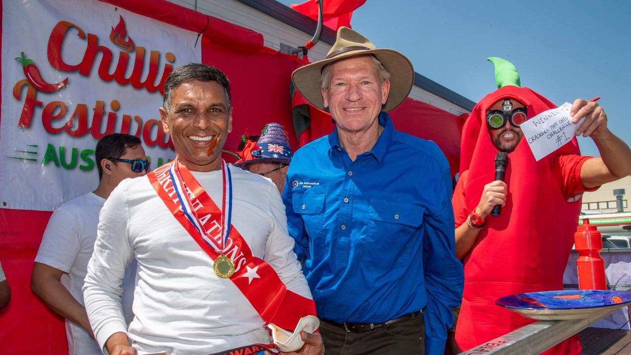 (From left) Winner of the Cracker’s Hot Chip Challenge, Feisal Abraham with Jim McDonald MP and Jace O’Connor at the Murphys Creek Chilli and Craft carnival. Sunday, September 22, 2024. Picture: Nev Madsen