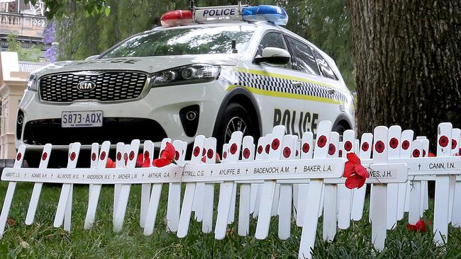 Police guarding the crosses near the war memorial, after reports of vandalism ahead of Remembrance Day. Picture Dean Martin