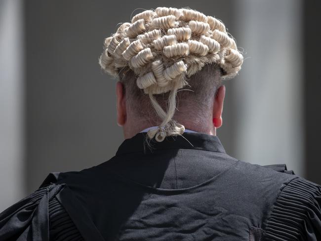 A barrister wears a wig at the Supreme Court in Brisbane, Tuesday, October 29, 2019. (AAP Image/Glenn Hunt) NO ARCHIVING