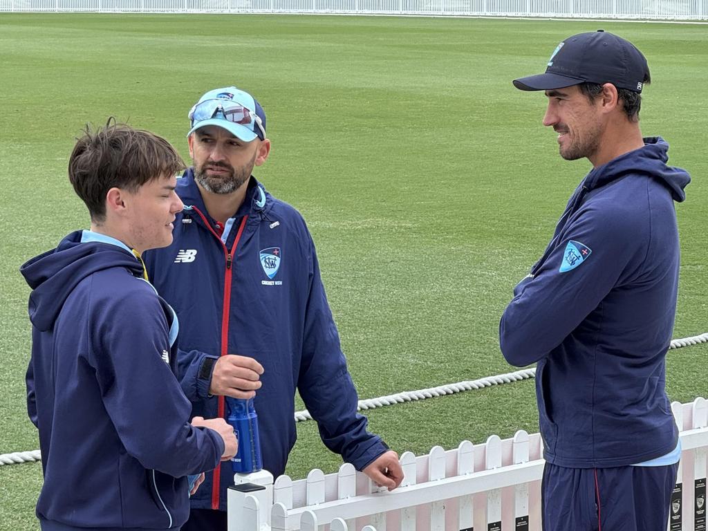 Kade Sutton (left) with Test cricketers Nathan Lyon (centre), Mitchell Starc (right). Picture: Supplied