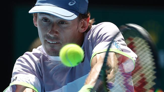 Alex De Minaur has kept his cool to cruise past Benjamin Bonzi on Rod Laver Arena. Picture: Michael Klein