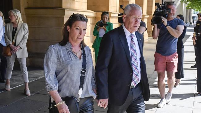 Commissioner Grant Stevens and his wife Emma leave the District Court on October 3. Picture: Roy VanDerVegt