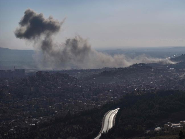 Smoke billows following an Israeli air strike on the outskirts of Damascus. Picture: AFP