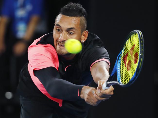 Nick Kyrgios lunges at a backhand. Picture: Michael Klein