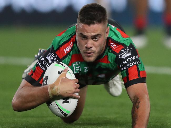 Souths Corey Allan scores a try during the Souths v Roosters NRL match at ANZ Stadium, Homebush. Picture: Brett Costello