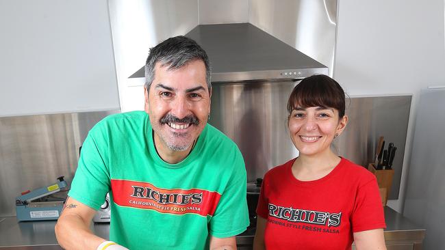 Richie Pinard and his wife Mary at home in Preston, where they make their authentic Mexican salsa sauces. Picture: Ian Currie