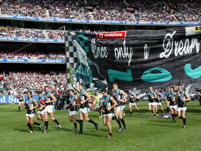 Port Adelaide runs out ahead of the decider.