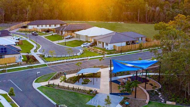 Families are moving out of the city to a growth corridor south of Brisbane where they can afford a back yard.