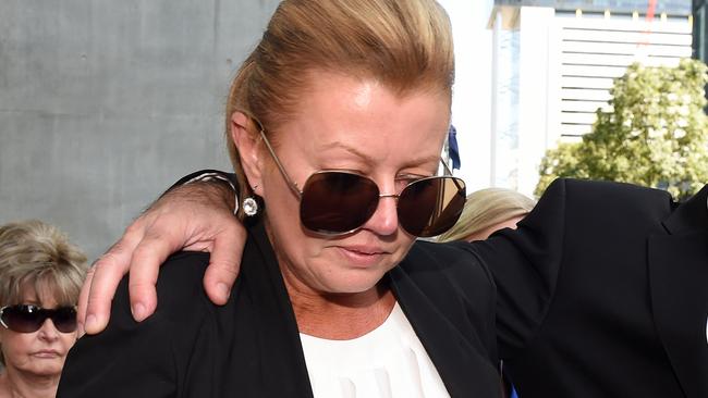 Belinda Otton, partner of former Billabong boss Matthew Perrin, leaves the District Court in Brisbane. Pic: AAP