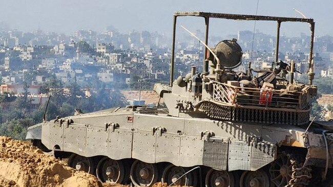 IDF soldiers on an armed vehicle during a military operation around at Al-Shifa hospital in Gaza City. Picture: Israeli Defence Forces/AFP