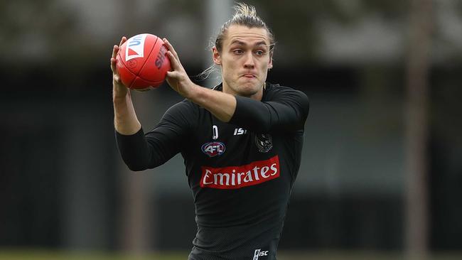 Could it be time to trade Darcy Moore in SuperCoach? Picture: Getty