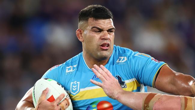 GOLD COAST, AUSTRALIA - MAY 04: David Fifita of the Titans is tackled during the round nine NRL match between Gold Coast Titans and Melbourne Storm at Cbus Super Stadium, on May 04, 2024, in Gold Coast, Australia. (Photo by Chris Hyde/Getty Images)