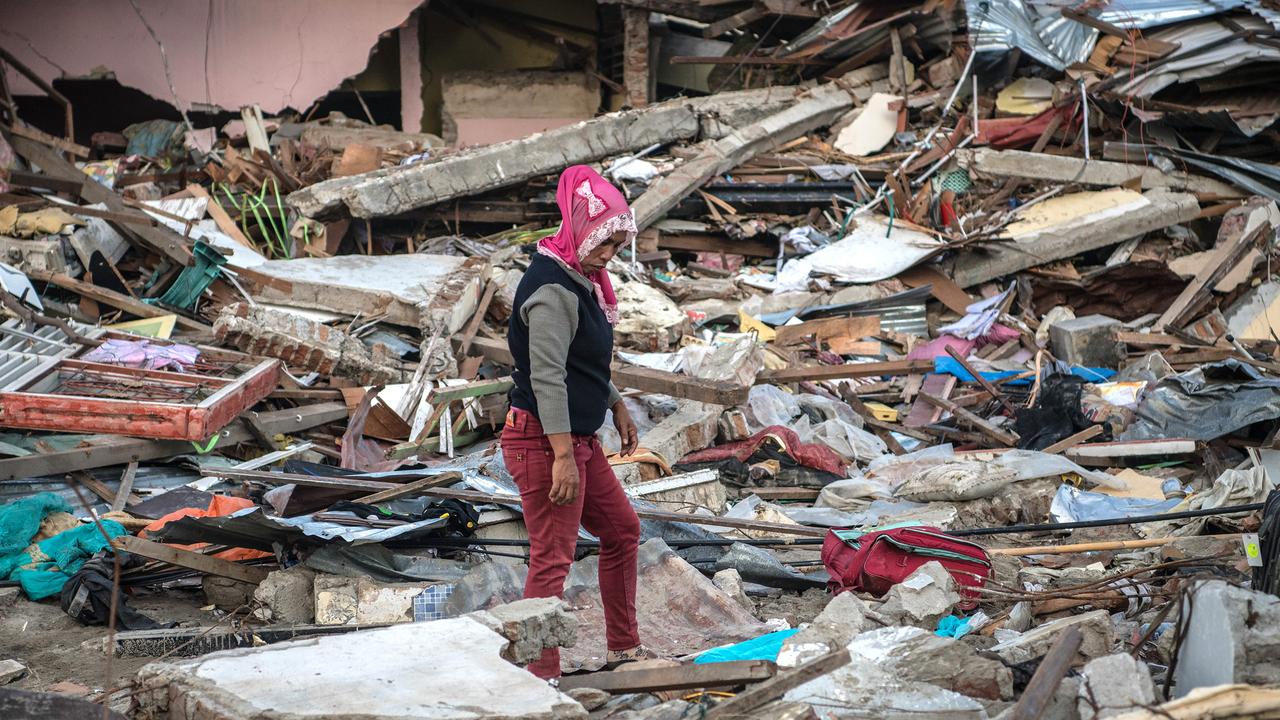 Indonesia Earthquake, Tsunami: Victims Buried In Mass Graves As Death ...