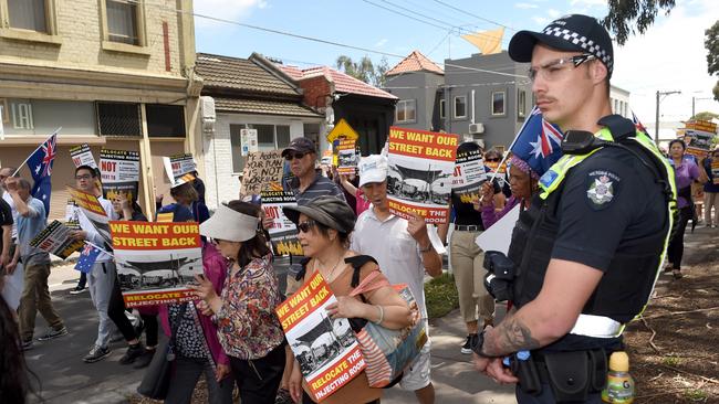 Business owners and residents of Richmond protest against the safe injecting room, which they believe is plaguing the suburb. Picture: Tony Gough