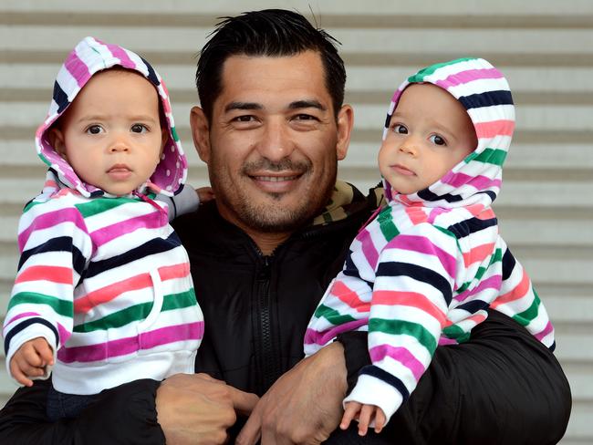 Francis Cullimore pictured with his two twin daughters Pippi and Lilly-Fern. Picture: Simon Cocksedge