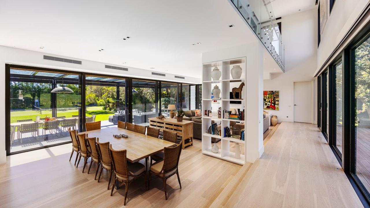 Inside the home feels spacious thanks to its high ceilings.