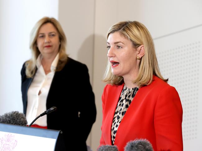 Premier Annastacia Palaszczuk watches on as Health Minister Shannon Fentiman speaks at a press conference earlier this year. Picture: Steve Pohlner