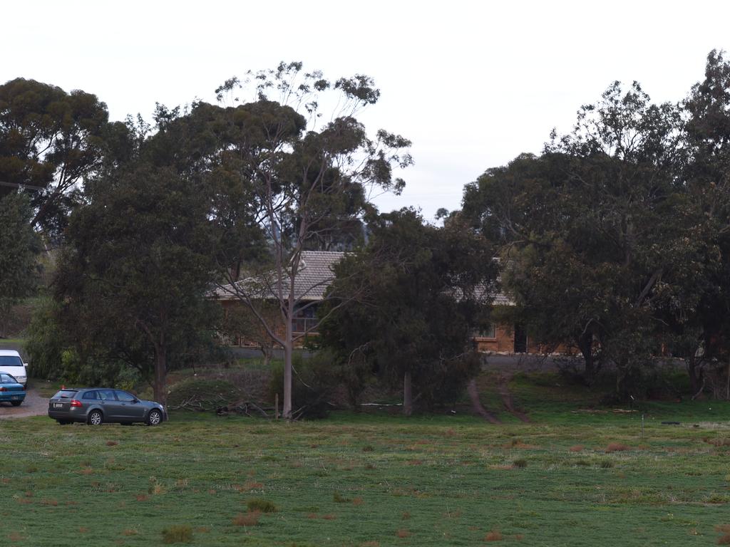 Police at the house in Hillier, in Adelaide’s north, on the day the three bodies were found. Picture: Sam Wundke