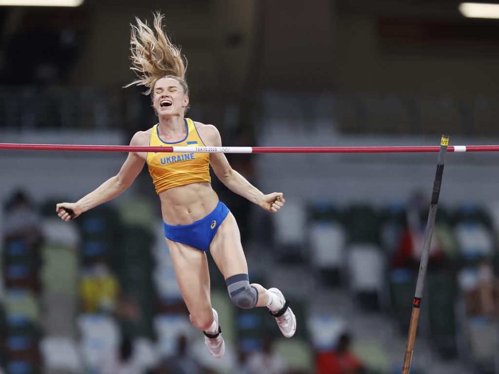 Ukraine’s Yana Hladiychuk celebrates making it over in the women’s pole vault qualification. Picture: Alex Coppel