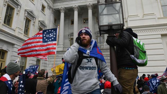 Demonstrators breeched security and entered the Capitol as Congress debated the a 2020 presidential election Electoral Vote Certification. Picture: Roberto Schmidt / AFP