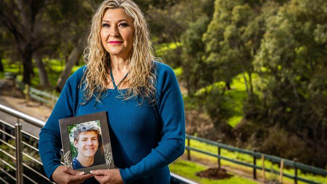 Sharlene Lynch with a photo of her son Scott, who took his own life a week before his 18th birthday in 2011. Picture: Tom Huntley