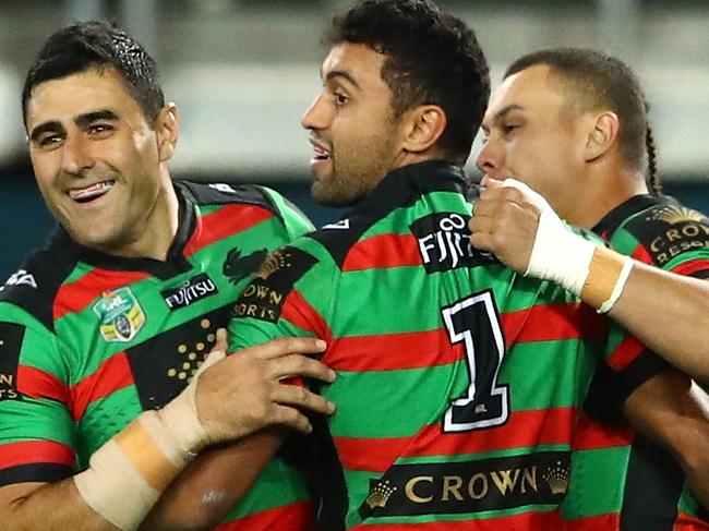 SYDNEY, AUSTRALIA - AUGUST 10: Alex Johnston of the Rabbitohs celebrates scoring a try with team mates during the round 23 NRL match between the South Sydney Rabbitohs and the Canterbury Bulldogs at ANZ Stadium on August 10, 2017 in Sydney, Australia.  (Photo by Cameron Spencer/Getty Images)