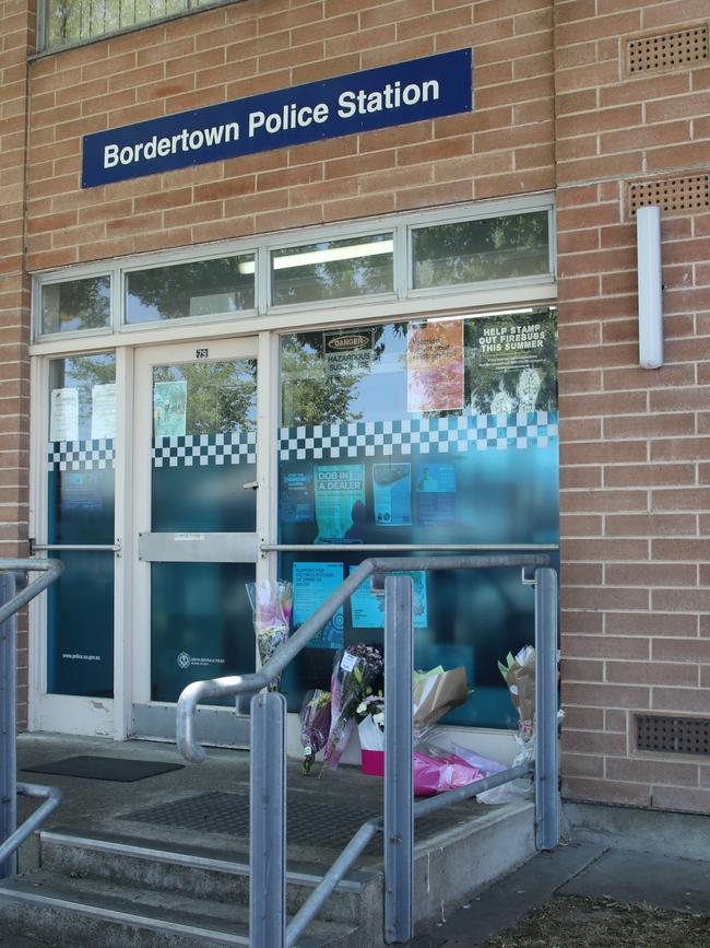 Flowers lefts outside the Bordertown Police Station for Brevet Sergeant Jason Doig. Picture: NCA NewsWire / Dean Martin