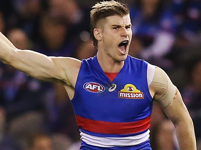 MELBOURNE, AUSTRALIA - MAY 04: Billy Gowers of the Bulldogs celebrates a goal during the round seven AFL match between the Western Bulldogs and the Richmond Tigers at Marvel Stadium on May 04, 2019 in Melbourne, Australia. (Photo by Michael Dodge/Getty Images)