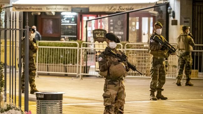 French soldiers, part of national security alert system ‘Sentinelle’, patrol near Notre Dame Basilica in Nice, France on Saturday. Picture: Getty Images