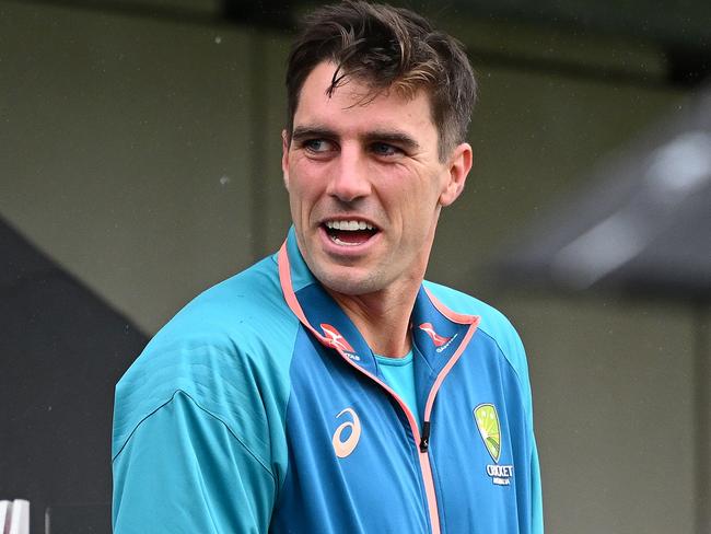 MANCHESTER, ENGLAND - JULY 23: Pat Cummins of Australia smiles at the fans as he leaves the players balcony for the end of match presentations during day five of the LV=Insurance Ashes 4th Test Match between England and Australia  at Emirates Old Trafford on July 23, 2023 in Manchester, England. (Photo by Clive Mason/Getty Images)