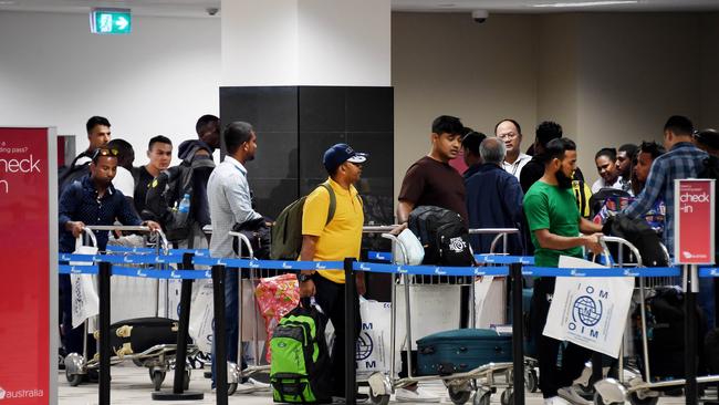 After years in Australian detention on Manus Island asylum-seekers depart from Port Moresby Airport this week.