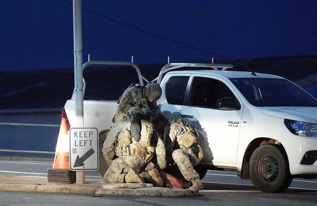 A man is arrested by police at the Daly St bridge in Darwin. Picture: Keri Megelus