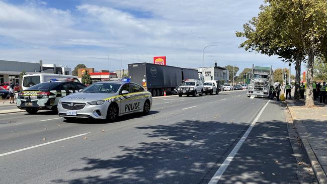 Emergency services at the scene of a serious crash between a truck and a pedestrian at Clearview. Picture: Caleb Bond