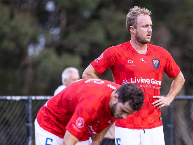 Gold Coast Knights players Roman Hofmann (left) and Mitch Nichols stand over a dead ball during the NPL Queensland Round 6 clash with Logan Lightning. Photo: Capture One- Sports Media