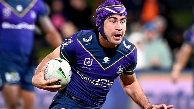 SUNSHINE COAST, AUSTRALIA – JUNE 19: Jahrome Hughes of the Storm breaks free from the defence during the round 15 NRL match between the Melbourne Storm and the Wests Tigers at Sunshine Coast Stadium, on June 19, 2021, in Sunshine Coast, Australia. (Photo by Bradley Kanaris/Getty Images)