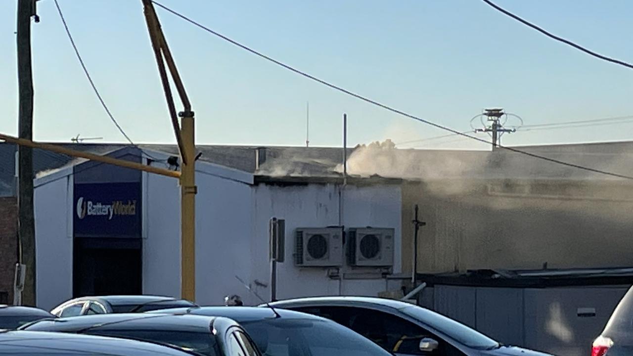 Smoke from the Battery World premises during the fire.