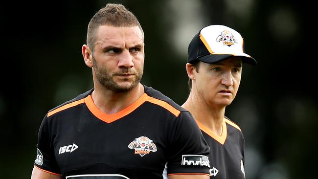 Robbie Farah and Tigers coach Jason Taylor during the Wests Tigers first pre season training session in Leichhardt .Picture Gregg Porteous