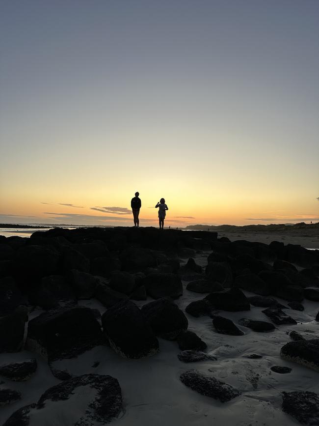 Skylar and Quinn Webster at a campsite in Killarney at dusk. Picture: Ellen Webster, Kennington.