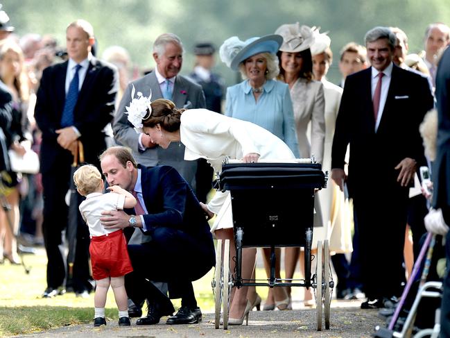 Prince Charles, Prince of Wales, Camilla, Duchess of Cornwall and Carole Middleto walk behind Catherine, Duchess of Cambridge, Prince William, Duke of Cambridge, Princess Charlotte of Cambridge and Prince George of Cambridge leaving the Church of St Mary Magdalene on the Sandringham Estate after the Christening of Princess Charlotte of Cambridge on July 5, 2015 in King’s Lynn, England. Picture: Getty