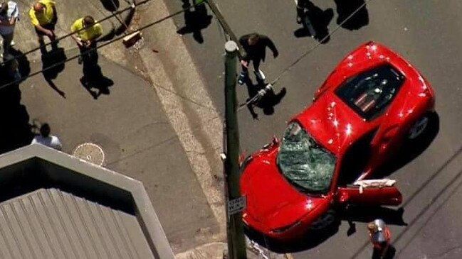 Two men have been hospitalised after a Ferrari crashed into a power pole in a single vehicle smash on the Princes Hwy at St Peters. Picture: 7 News