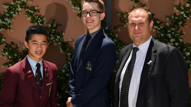 Oakhill College’s Chris Teo, Rouse Hill Anglican College’s James Speechley and Castle Hill RSL CEO David O'Neil at White Ribbon Day launch.